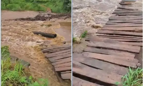 Chuva leva ponte na GO-479 e moradores improvisam tirolesa