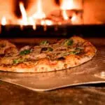 Onde comer pizza em Pirenopolis? 5 opções bem avaliadas