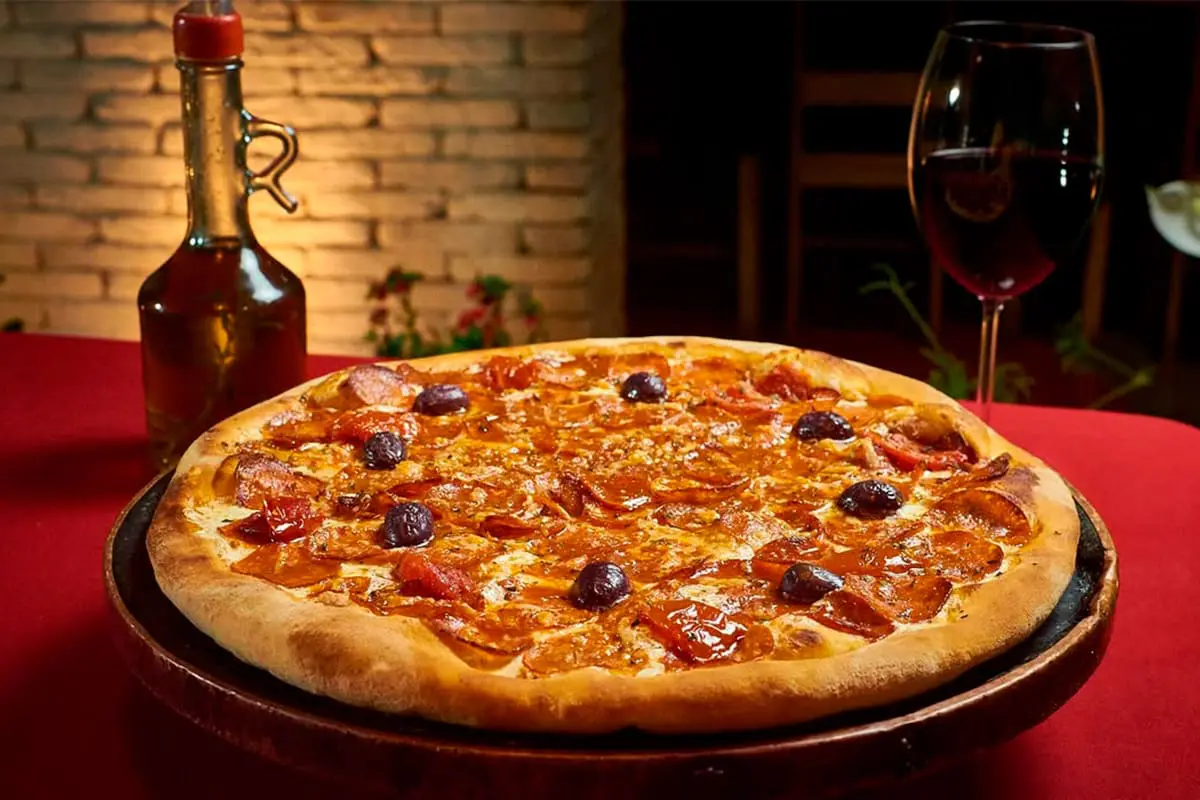 Onde comer pizza em Pirenopolis? 5 opções bem avaliadas 